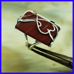 Silver ring with a red jasper