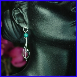 Thin silver earrings with...